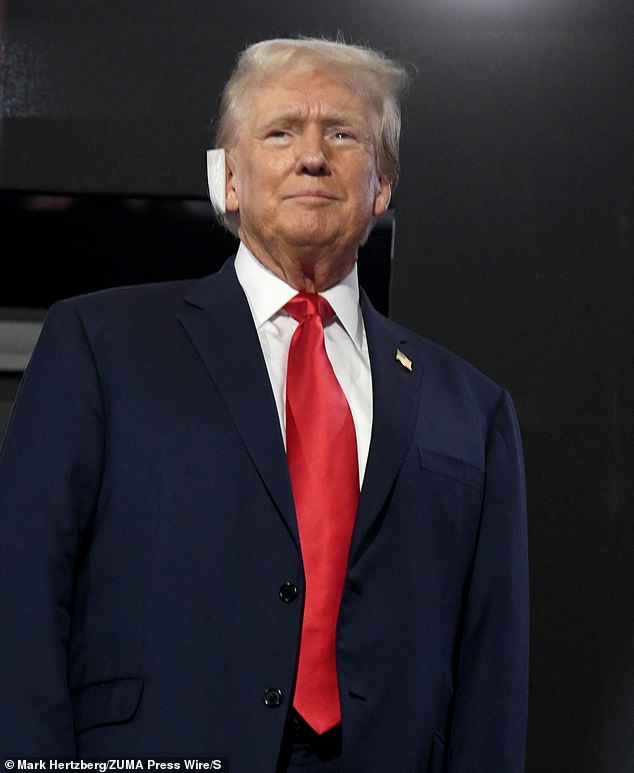 Donald Trump attends the Republican National Convention at the Fiserv Forum in Milwaukee with his ear in a bandage after the attempt on his life