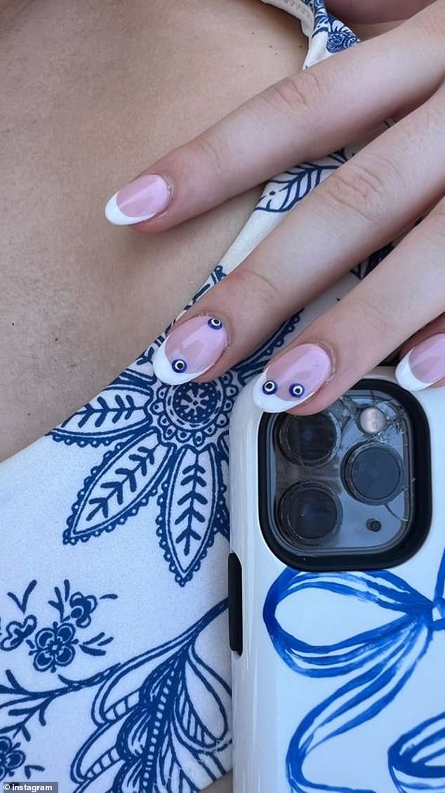 On Wednesday she treated herself to a luxurious manicure with 'evil eyes'