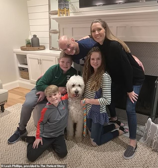 Leah Phillips (above right with her husband and children) was diagnosed with stage four non-small cell lung cancer at age 43, despite never having smoked