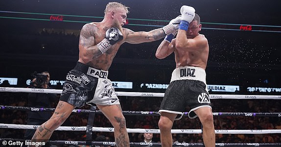 DALLAS, TEXAS - AUGUST 5: Jake Paul throws a left to Nate Diaz during the fifth round of their fight at the American Airlines Center on August 5, 2023 in Dallas, Texas. (Photo by Sam Hodde/Getty Images)