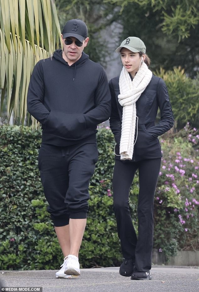 James Stewart, 48, (left) looked like the devoted dad he is on Sunday as he took his daughter Scout, 12, (right) for a brisk walk in Sydney