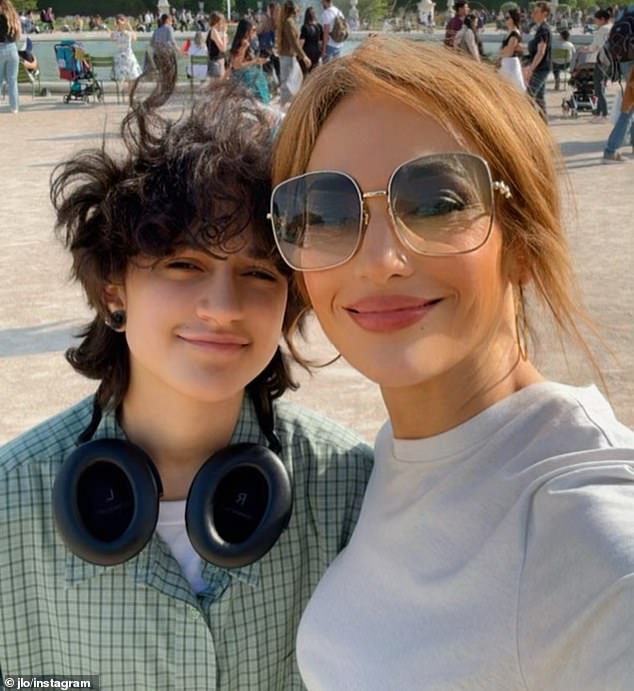 Jennifer Lopez took to Instagram on Sunday to share a post dedicated to her two children, fraternal twins Emme and Max, 16. She wore a chic pair of square sunglasses as she posed with Emme, who she refers to with gender-neutral they/them pronouns.