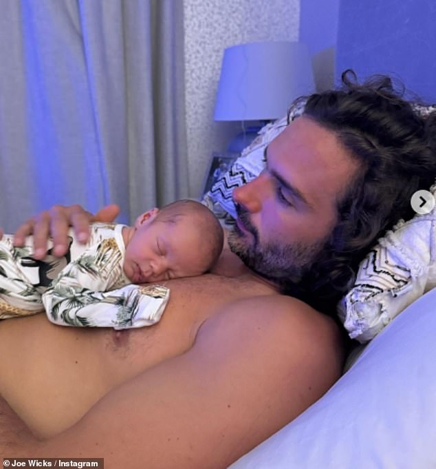 Joe also cradled the newborn on his chest as they enjoyed a cuddle in another adorable photo