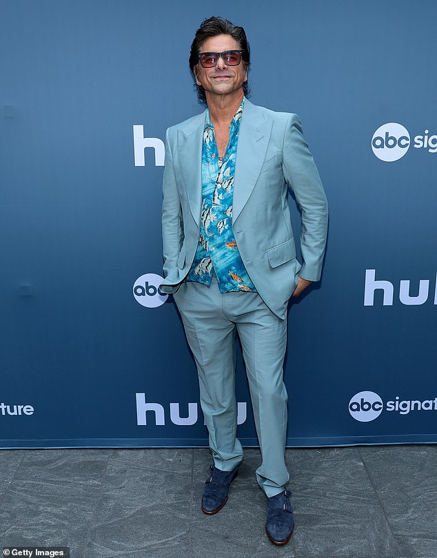 John Stamos, 60, said he 'probably wouldn't be here' if it weren't for his therapist (pictured in New York City on July 16)