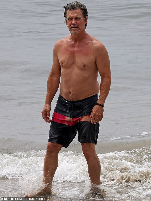 Josh Brolin got soaking wet as he showed off his muscular torso during a day at the beach in Santa Barbara this week