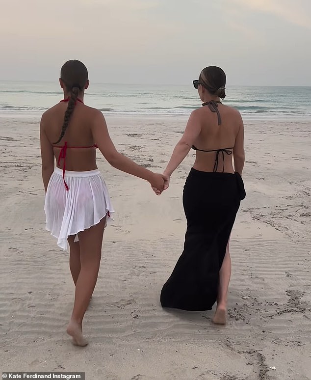 The TV personality shared an adorable video of the pair running hand-in-hand along the beach, admitting she 