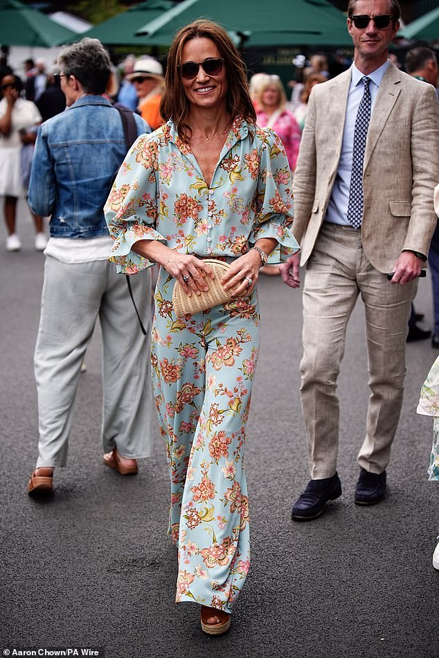 Dressed in a floral jumpsuit that's perfect for summer, Kate's younger brother, 40, attended day 12 of Wimbledon on Friday