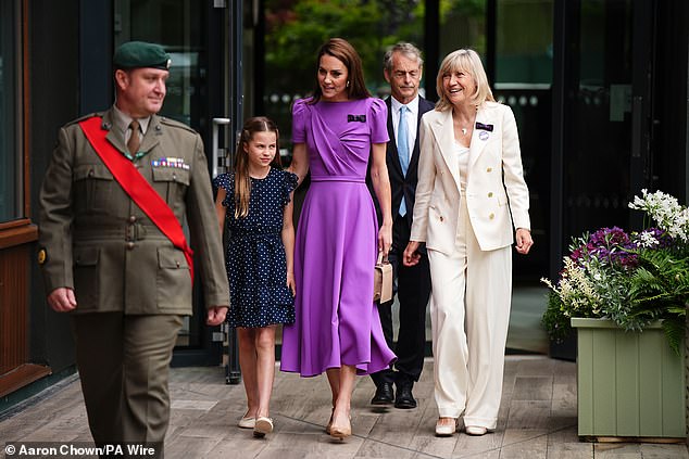 Kate Middleton joins Princess Charlotte as she chats to players