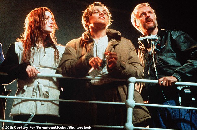 The Mare of Easttown star describes filming the famous 'I'm Flying' scene, in which she and Leo, 49, kiss at the front of the boat. She admits the kiss 'wasn't as great as it looked' (pictured with Leo and director James Cameron)