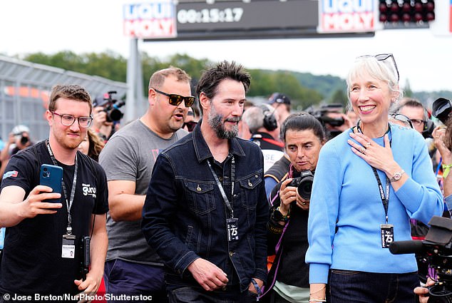 Keanu Reeves and his girlfriend Alexandra Grant stole the show at a motorcycle racing event on Sunday