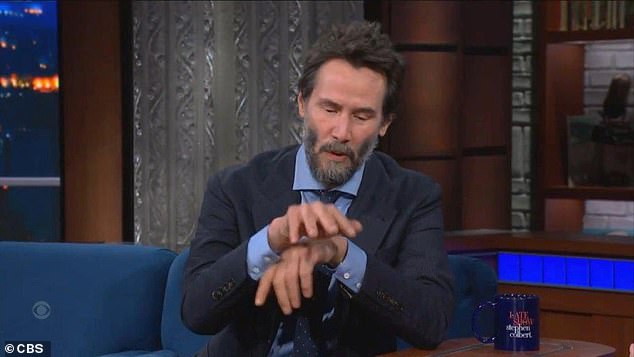 Keanu Reeves gave a dramatic reconstruction of how he broke his kneecap during filming during an appearance on The Late Show with Stephen Colbert on Monday.