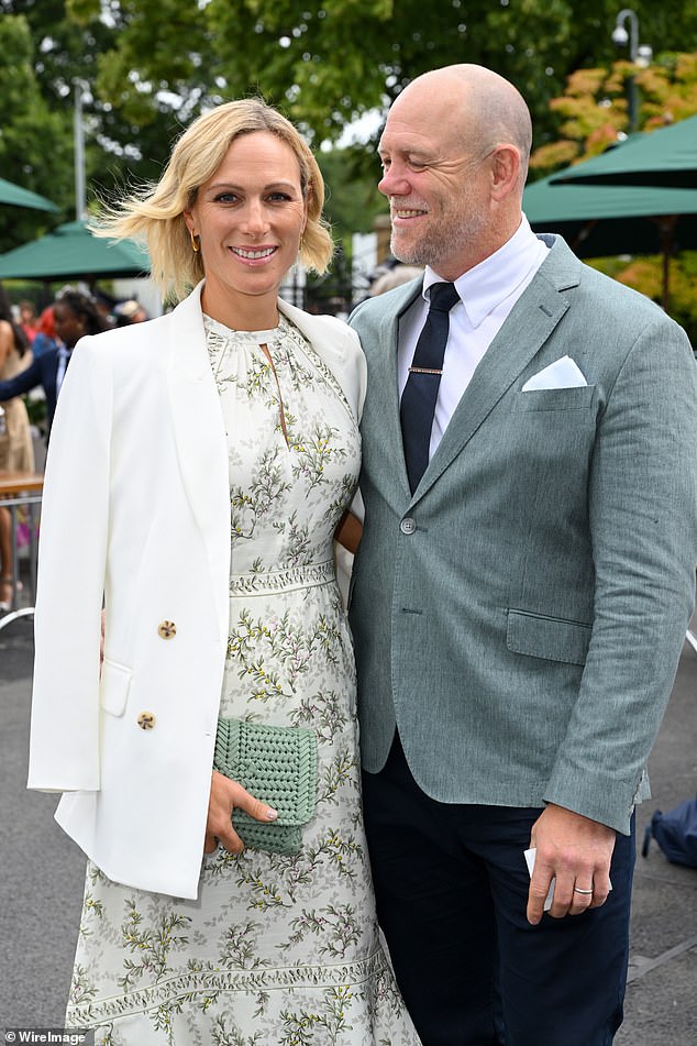 Dressed in a chic green and white floral print midi dress, paired with a white jacket, Princess Anne's daughter looked elegant on the day of the quarter-finals, with her husband Mike in a matching slate grey coat