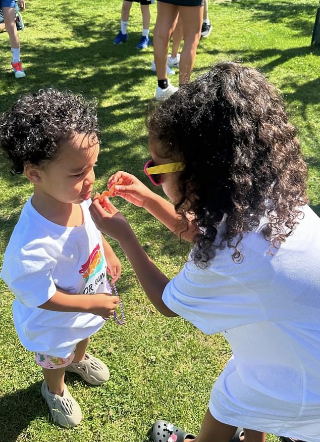 The star shared a photo of True attempting to grow a hairy orange moustache on her brother