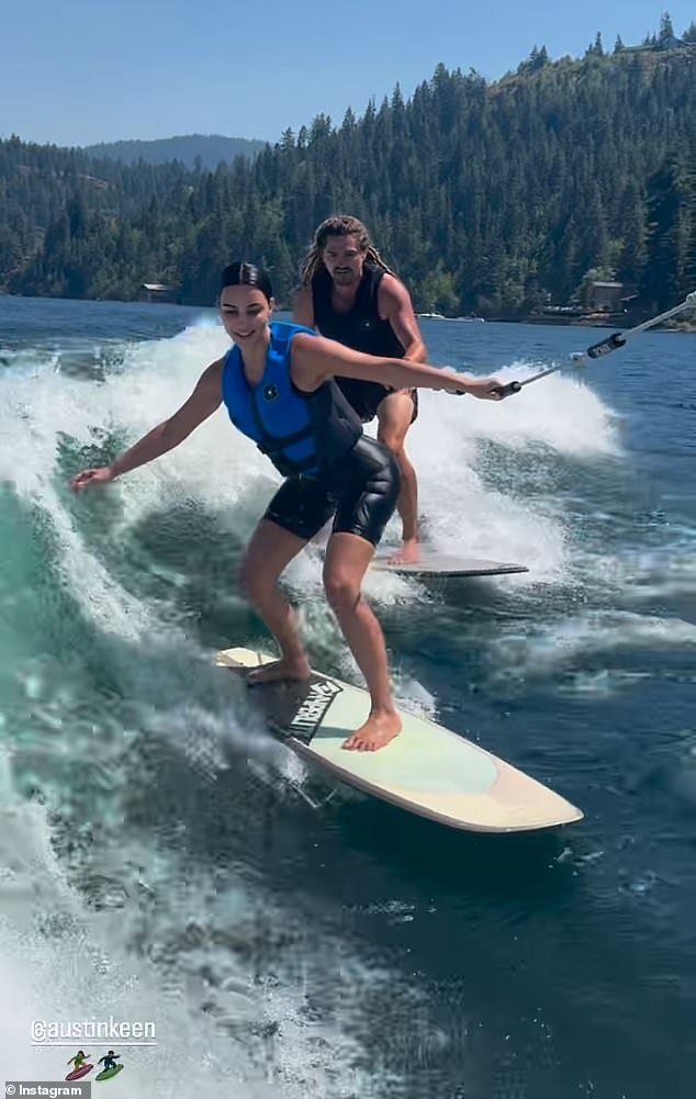 The 43-year-old SKIMS founder shared two video clips on her Instagram Stories of her wakeboarding lessons