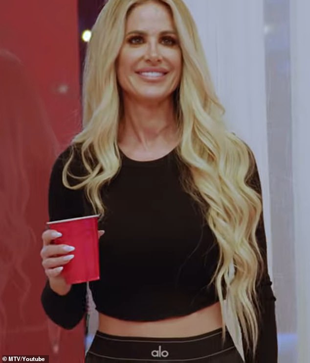 Kim Zolciak-Biermann said fans will 'have to wait and see' what happens between her and Chet Hanks in Surreal Life: Villa of Secrets