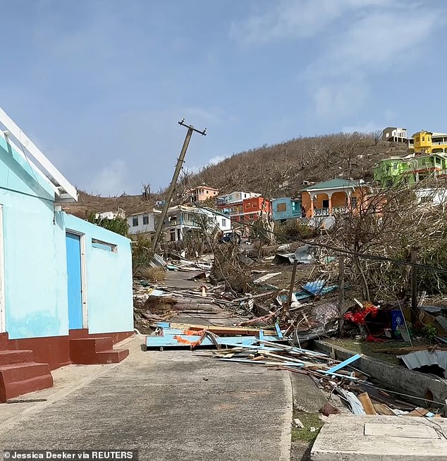 Wreckage is seen outside damaged homes after Hurricane Beryl passed through, in Petite Martinique, Grenada, July 2, 2024