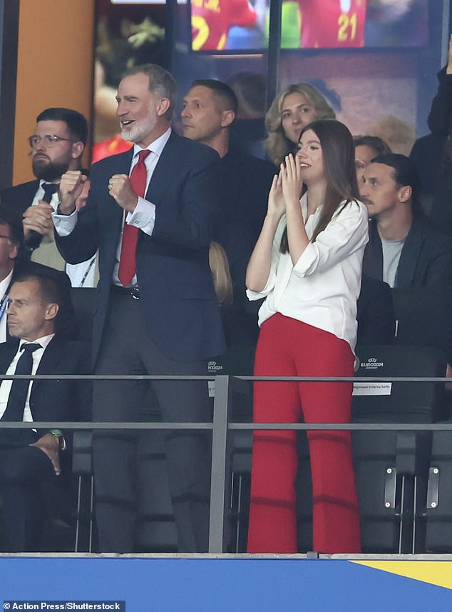 King Felipe and Infanta Sofia cheered as they watched Spain beat England 2-1 tonight