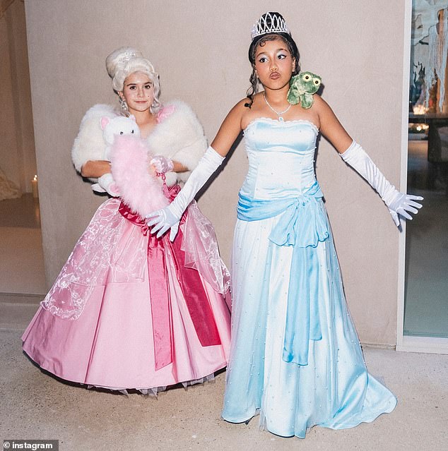 Penelope, left, with Kim Kardashian's daughter North West, right