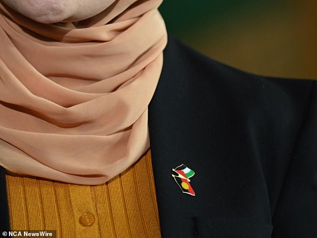 Senator Fatima Payman wore a pin featuring the Aboriginal and Palestinian flags as she announced her resignation on Thursday. Photo: NewsWire/ Martin Ollman
