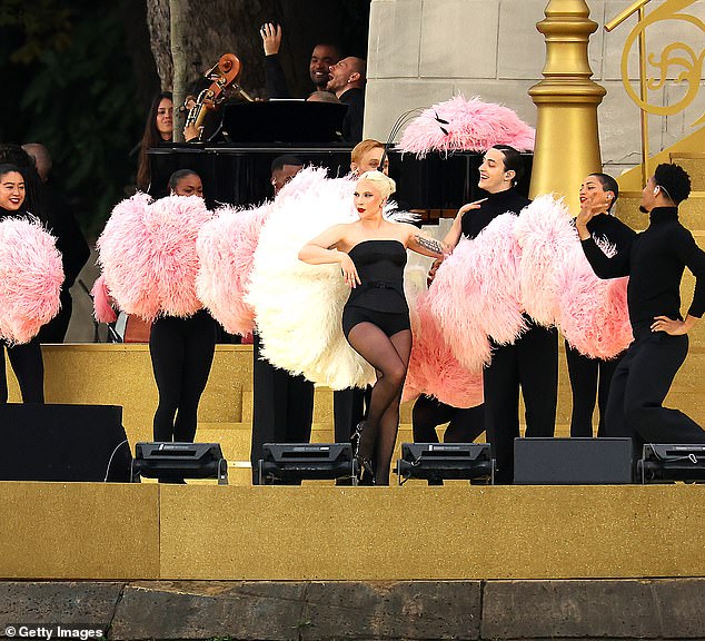 The singer looked sensational as she performed on a tall staircase for her rumoured duet with Celine Dion, 56