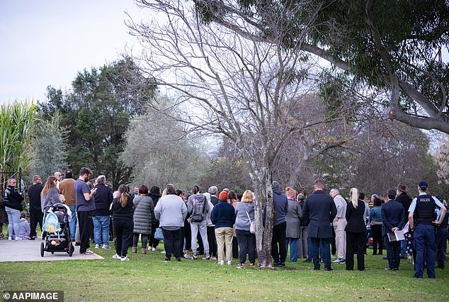 Devastated community members gathered at a neighbourhood vigil in Chifley Park in Lalor Park in Sydney's west on Thursday for the three young children who died in a house fire on Sunday.