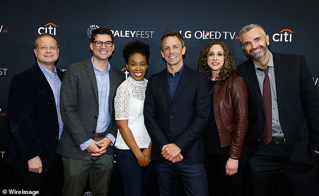 A comedian, writer and former late night show host has come out as gay on the last day of Pride month.  Pictured: Writers Sal Gentile, Amber Ruffin, Jenny Hagel and Alex Baze with Seth Meyers