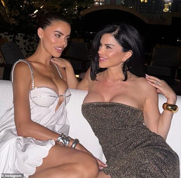 Lauren Sanchez (right) showed off a fuller bust as she spent time with her model friend Brooks Nader (left) in New York on Monday