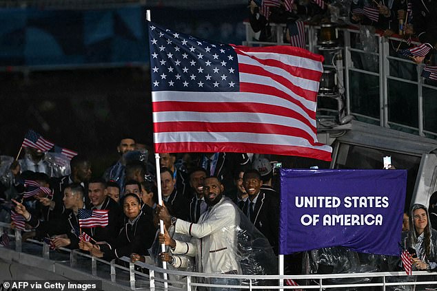 An image of LeBron James holding the American flag during the Olympics has become a meme