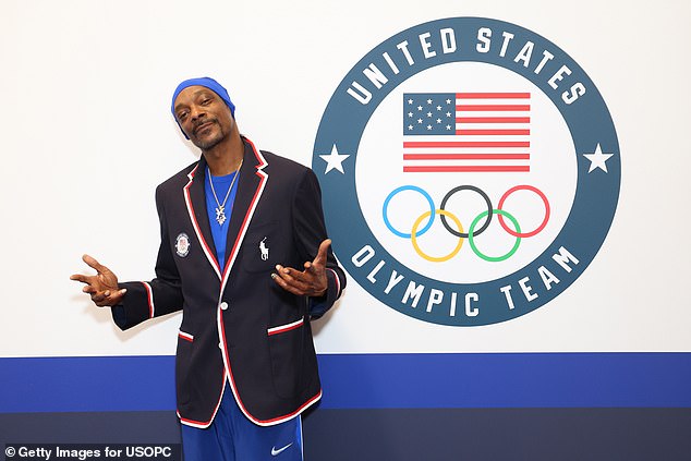 Snoop Dogg will carry the Olympic torch through the streets of a Parisian suburb on Friday