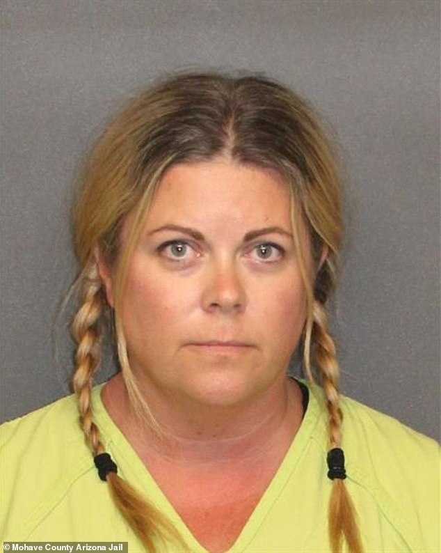 Robyn Rogers, 44, was arrested Thursday for allegedly having sex with a 17-year-old - after officers made contact with her and the boy at a home in Lake Havasu City, Arizona, Thursday. She is seen here in her arrest photo at the Mohave County Arizona Jail Friday