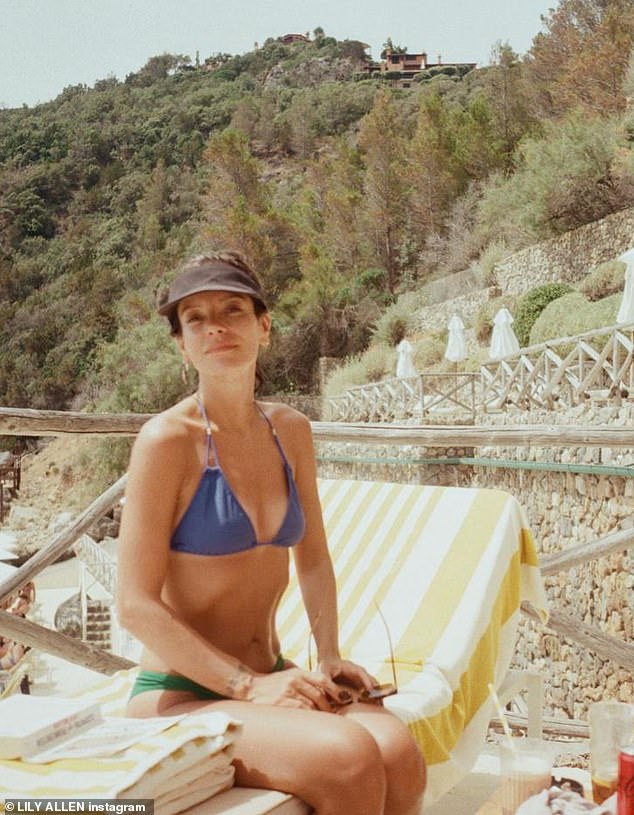 Lily Allen looked radiant in a blue and green bikini as she shared a series of filmed vacation snaps on Instagram on Monday