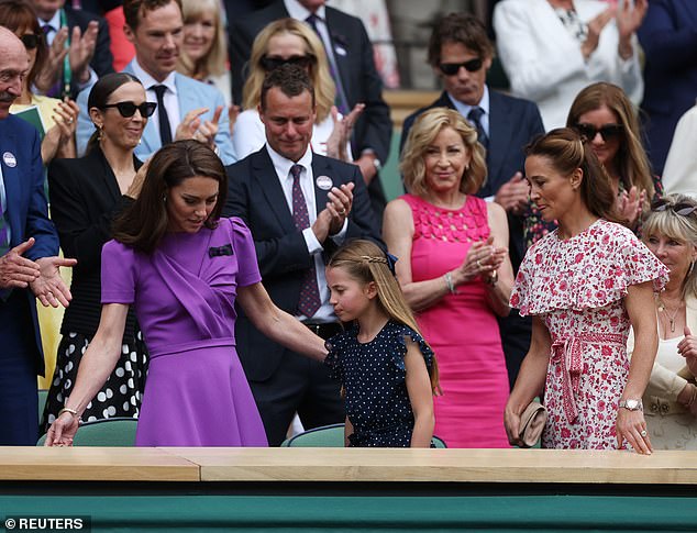 When Charlotte and the Princess of Wales arrived to take their seats in the Royal Box at Centre Court, they were greeted with a standing ovation and thunderous applause.