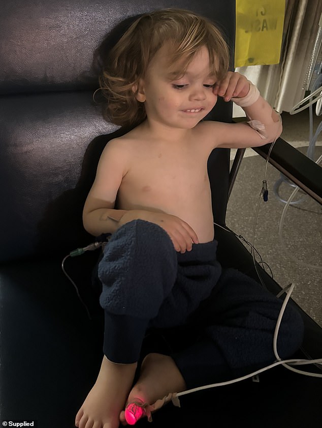 The little 'cheeky' and 'bubbly' boy (pictured undergoing treatment) now has to receive steroids twice a day and chemotherapy twice a week, but the family have been told he will need chemotherapy for the next two and a half years