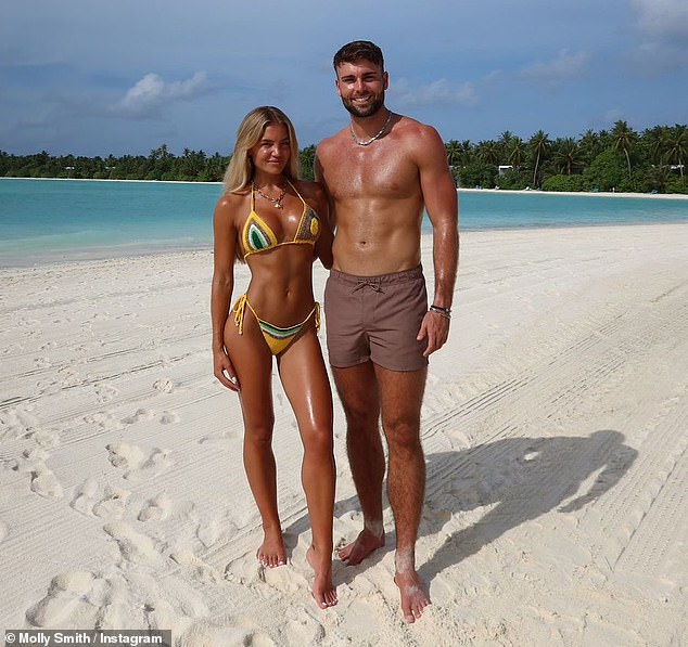Love Island's Molly Smith showed off her incredible washboard abs as she shared a sneak peek of her romantic getaway to the Maldives with boyfriend Tom Clare