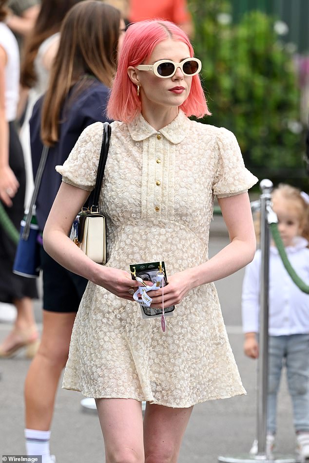 Lucy Boynton, 30, showed off her bright pink hair as she led the stars on the first day of Wimbledon on Monday