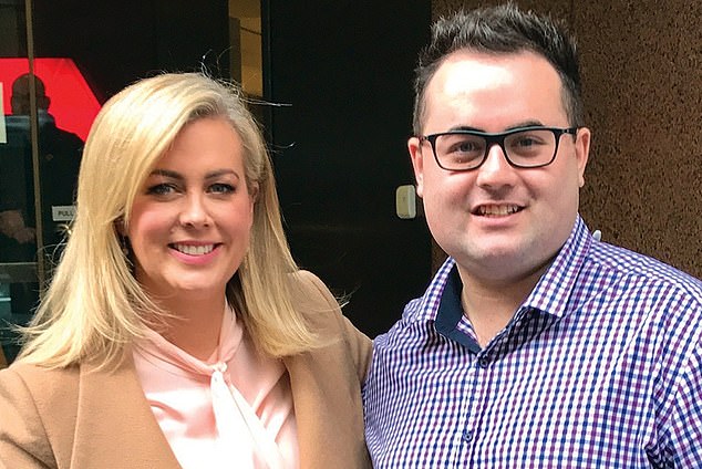 Hemmings is pictured taking a photo with Samantha Armytage