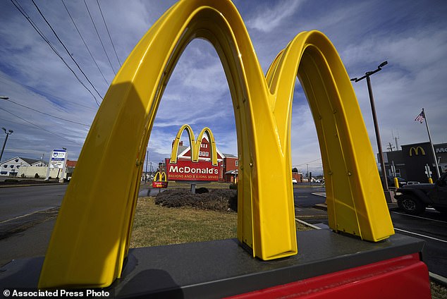 McDonald's restaurant signs are shown in East Palestine, Ohio, February 9, 2023. McDonald's reports earnings on Monday, July 29, 2024