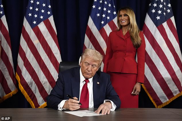 Melania Trump joins Donald Trump as he signs papers to become Republican nominee