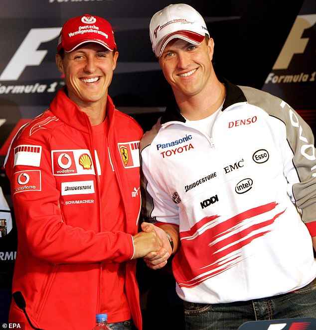 Michael Schumacher is pictured next to his brother Ralf in 2006