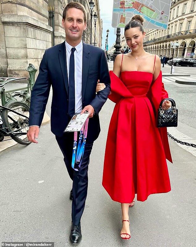 Miranda Kerr turned up the heat when she landed in Paris this week with her tech billionaire husband Evan Spiegel to attend the Olympics. Both pictured