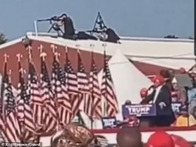 Dramatic new video of the assassination attempt on Donald Trump shows the moment Secret Service snipers on a rooftop fire at the gunman hundreds of yards away.