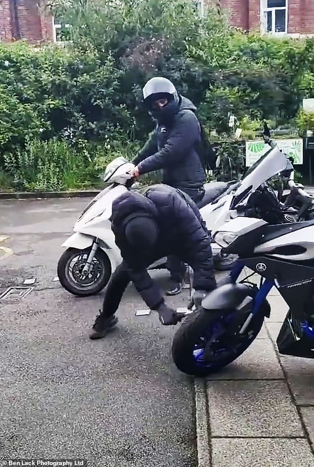 The two would-be bike thieves pulled up next to the expensive superbike in a Leeds car park and began trying to break the wheel lock holding the bike in place