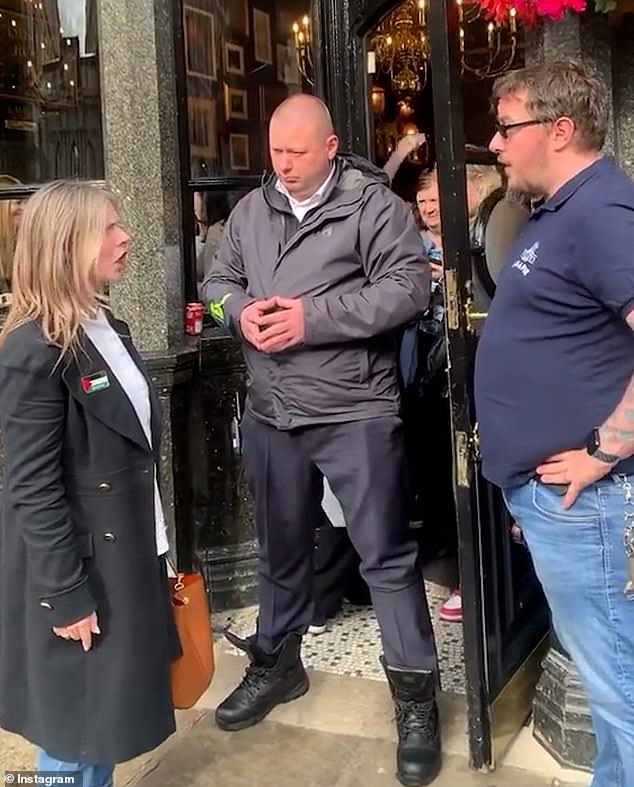 A woman is denied entry to a London pub because of the Palestinian flag on her jacket