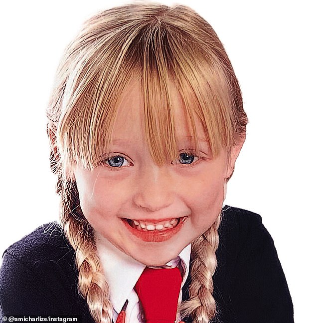 Ami, five years old, in her first school photo