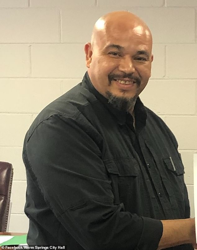 Police in a Georgia town are baffled after all but one were asked to immediately surrender their guns and badges, with little explanation. Pictured: Fired police chief Emilio Quintana