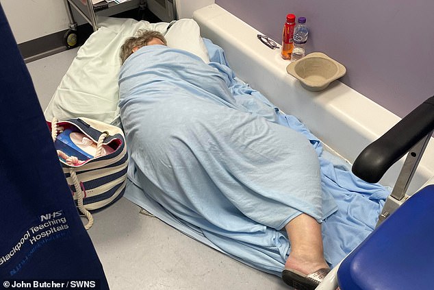 Madeleine Butcher, 62, who has terminal cancer, was forced to lie on the floor of the emergency room as she waited for treatment for a possible sepsis infection because she was too uncomfortable to sit on a chair in the ward at Blackpool Victoria Hospital