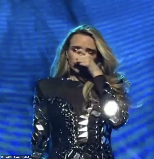 Nadine Coyle burst into tears as she paid tribute to her late bandmate Sarah Harding during the Girls Aloud tour at the M&S Bank Arena in Liverpool on Sunday.