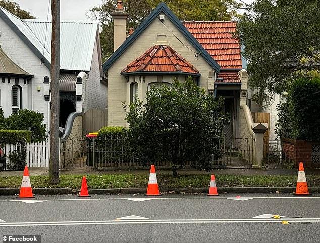 A resident has used orange traffic cones to block on-street parking for at least two cars near his home in Leichardt, in the city's west-central area