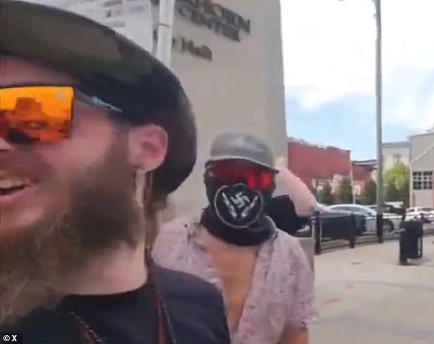 Neo Nazis are filmed hurling disgusting racist slurs at black children