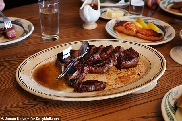 Wells famously wrote restaurant reviews for the Times for 12 years, thoroughly dissing some beloved establishments like Peter Luger Steakhouse (pictured is the food).